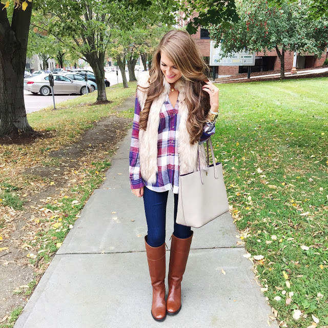 Pair a sweater vest with plaid top