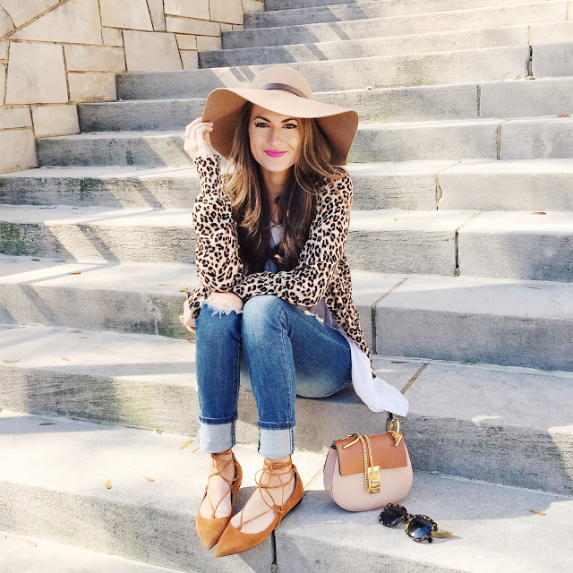 floppy hat and leopard cardigan